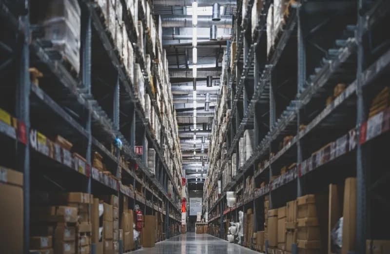 Warehouse stocked with products to represent ai in retail and e-commerce to help with inventory