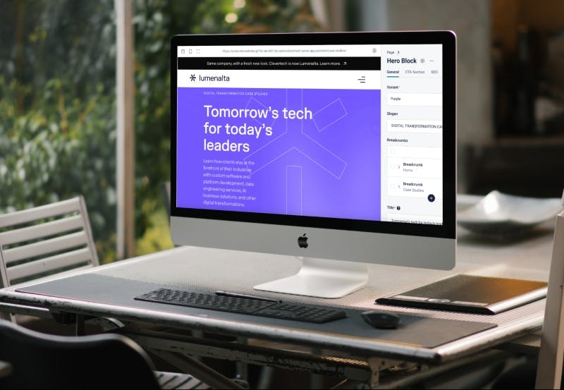Computer screen on a desk with the Lumenalta website in the backend of the Storyblok CMS