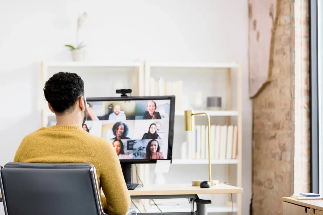 Engineer on virtual meeting with teammates, building trust