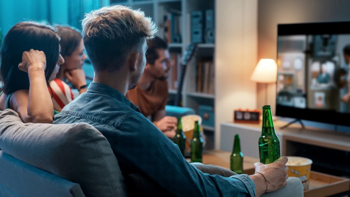 young people watching TV