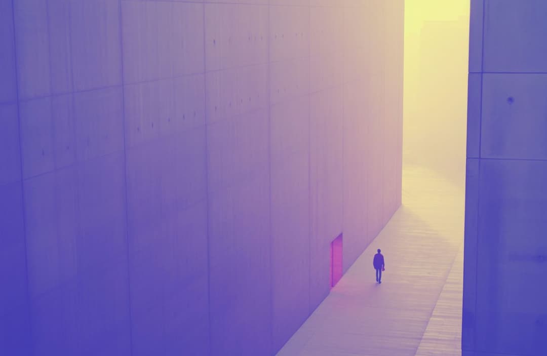 Colorful bird's eye view of a man walking alone